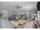 Open-concept living room seamlessly connects to the kitchen and dining area for easy entertaining at 414 King St, Waxhaw, NC 28173