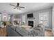 Comfortable living space, connecting kitchen and dining, complete with fireplace and tv at 414 King St, Waxhaw, NC 28173