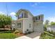 View of the home featuring siding and a private driveway leading to the attached garage at 414 King St, Waxhaw, NC 28173