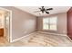 Comfortable bedroom featuring neutral walls, carpet, a ceiling fan, and an attached bathroom at 4751 Kemp Dellinger Rd, Maiden, NC 28650