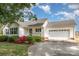 Charming single-story home boasts a two-car garage, well-maintained landscaping, and inviting curb appeal at 4751 Kemp Dellinger Rd, Maiden, NC 28650
