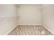 Large walk-in closet featuring carpeted floors and wire shelving for organized storage at 4751 Kemp Dellinger Rd, Maiden, NC 28650