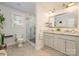 Modern bathroom with a double vanity, granite countertops, and a glass-enclosed shower at 4838 Holbrook Dr, Charlotte, NC 28212