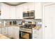 Well-equipped kitchen with stainless steel range and oven at 4838 Holbrook Dr, Charlotte, NC 28212