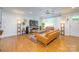 Bright living room with hardwood floors, stylish furniture, and ample natural light at 4838 Holbrook Dr, Charlotte, NC 28212