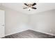 Minimalist bedroom with gray flooring, a ceiling fan, fresh paint, and natural light at 5018 Drake Pond Ln, Rock Hill, SC 29732