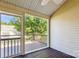 Relaxing screened-in porch with a view of the backyard and ample space for outdoor seating at 5018 Drake Pond Ln, Rock Hill, SC 29732