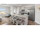 Modern kitchen with granite countertops, stainless steel appliances, and island seating at 547 Trading Post Ln, York, SC 29745