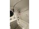 A bathroom with marble-look tile, a tub and a gray vanity at 642 Boger St, Mooresville, NC 28115