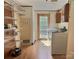 Functional laundry area with shelving and a utility sink, providing convenience and organization at 668 Osteen Rd, York, SC 29745