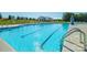 Sparkling community pool with lounge chairs and clear blue water for residents to enjoy at 739 Wagon Cross Ct, York, SC 29745