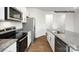 Modern kitchen with stainless steel appliances and sleek countertops for easy cooking at 739 Wagon Cross Ct, York, SC 29745