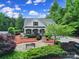 Beautiful single-story home with a covered front porch and meticulous landscaping in a tranquil setting at 7710 Grove Hall Ave, Mint Hill, NC 28227