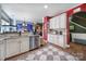 Modern kitchen with granite countertops, stainless steel appliances, and a charming decorative aesthetic at 7710 Grove Hall Ave, Mint Hill, NC 28227