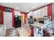 Functional kitchen with stainless appliances, counter seating, and easy access to the dining area at 7710 Grove Hall Ave, Mint Hill, NC 28227