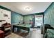 A unique room with green walls, wood floors, and a green table at 7710 Grove Hall Ave, Mint Hill, NC 28227