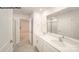Bright bathroom with double sink vanity, neutral walls, and large mirror at 917 Two Brothers Ln, York, SC 29745