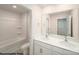 Bathroom with double sinks, white cabinets, and a tub shower combo at 917 Two Brothers Ln, York, SC 29745