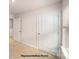 Bright hallway with neutral carpeting and white doors leading to various rooms at 917 Two Brothers Ln, York, SC 29745