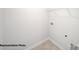 Bright storage room with tile flooring, and overhead shelving for added convenience at 917 Two Brothers Ln, York, SC 29745