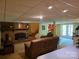 A cozy basement with a fireplace and a view to outside the glass paneled doors at , Hickory, NC 28602