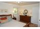 Bedroom with a bed, nightstands, and dresser, providing ample storage space at , Hickory, NC 28602