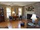 Comfortable living room with brick fireplace, hardwood flooring, and natural light at , Hickory, NC 28602