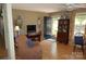 Inviting living room with hardwood floors, a dark green door, and traditional furnishings at , Hickory, NC 28602