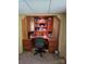 Basement office with built in cabinets and shelves for storing books and personal items at , Hickory, NC 28602