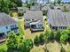 Aerial view of a home with a spacious backyard and lovely deck perfect for entertaining at 1001 Emory Ln, Fort Mill, SC 29708