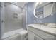 Bathroom features a glass-enclosed shower and modern vanity with oval mirror at 1001 Emory Ln, Fort Mill, SC 29708
