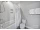 Cozy bathroom featuring a shower-tub combo, new toilet, and towel rack at 1001 Emory Ln, Fort Mill, SC 29708