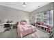 Charming bedroom featuring a desk, bed, window seat, and plenty of storage at 1001 Emory Ln, Fort Mill, SC 29708