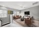 Spacious living room featuring comfortable seating and media console at 1001 Emory Ln, Fort Mill, SC 29708