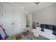 Playroom with carpet, table, ample storage, and 2 large windows for natural light at 1001 Emory Ln, Fort Mill, SC 29708