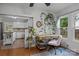 Cozy office with view into kitchen, natural lighting, and hardwood floors at 1001 Old Charlotte Rd, Concord, NC 28027