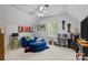 Upstairs bedroom with carpeted floors and ceiling fan provides a calm and relaxing space at 1002 4Th Ne St, Conover, NC 28613
