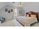 Upstairs bedroom with carpeted floors and ceiling fan provides a calm and relaxing space at 1002 4Th Ne St, Conover, NC 28613