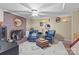 Inviting living room with a brick fireplace, ceiling fan and comfortable seating area at 1002 4Th Ne St, Conover, NC 28613