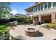 Beautiful outdoor stone patio with built-in fire pit and grill, perfect for outdoor gatherings and entertaining at 1002 4Th Ne St, Conover, NC 28613