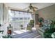 Relaxing screened porch with ceiling fan offers great space for outdoor living at 1002 4Th Ne St, Conover, NC 28613