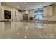 Modern kitchen with white cabinets, stainless steel appliances, and a spacious island at 1009 High Shoals Rd, Lincolnton, NC 28092
