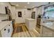 Modern kitchen with white cabinets, stainless steel appliances, and a center island at 1009 High Shoals Rd, Lincolnton, NC 28092