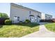 Two-story home with a spacious backyard, lawn, patio, and privacy fence at 10146 Hawkeye Dr # 2, Charlotte, NC 28273