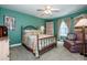 Bedroom with queen bed, sitting chair, natural lighting, and decorative artwork at 112 Eagle Chase Ln, Troutman, NC 28166