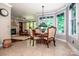 Bright eat-in kitchen nook with large windows offering scenic views and a cozy atmosphere at 112 Eagle Chase Ln, Troutman, NC 28166