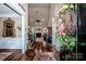 Grand foyer with hardwood floors, high ceilings, and staircase leading to living room at 112 Eagle Chase Ln, Troutman, NC 28166