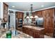 Gourmet kitchen featuring granite countertops, stainless steel appliances, and ample cabinetry at 112 Eagle Chase Ln, Troutman, NC 28166