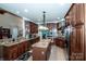 Spacious kitchen with an island, stainless appliances, and plenty of storage space at 112 Eagle Chase Ln, Troutman, NC 28166