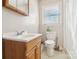 Bathroom with single sink vanity and toilet at 1177 Craigbrow Cir, Chester, SC 29706
